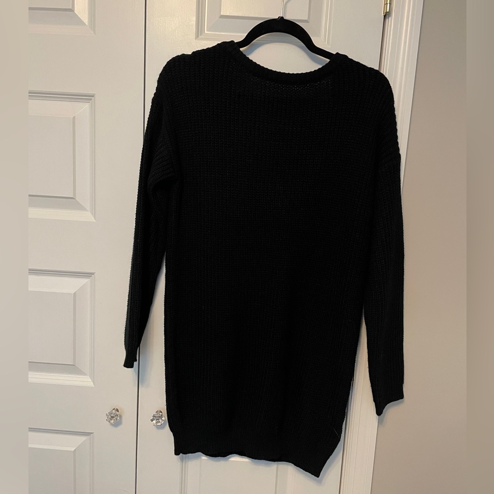 Lulu’s black knit dress with plung in back. Size Medium